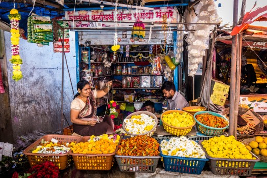 Vaishadi Rahul Hingmire and her son Rutik Rahul Hingmirekar at work in their flower shop.